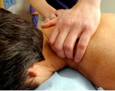 Image of man recieving massage at Brook Green Clinic Hammersmith